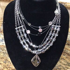 Lot of three smoky gray and silver tone necklaces. Great shape.